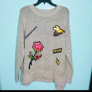 Sweater with patches